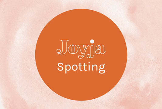 Joyja logo with the word "spotting" as a subtitle