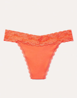 Joyja Lily period-proof panty in color Living Coral and shape thong