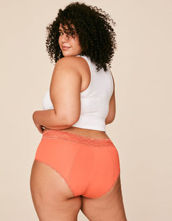 Joyja Amelia period-proof panty in color Living Coral and shape high waisted