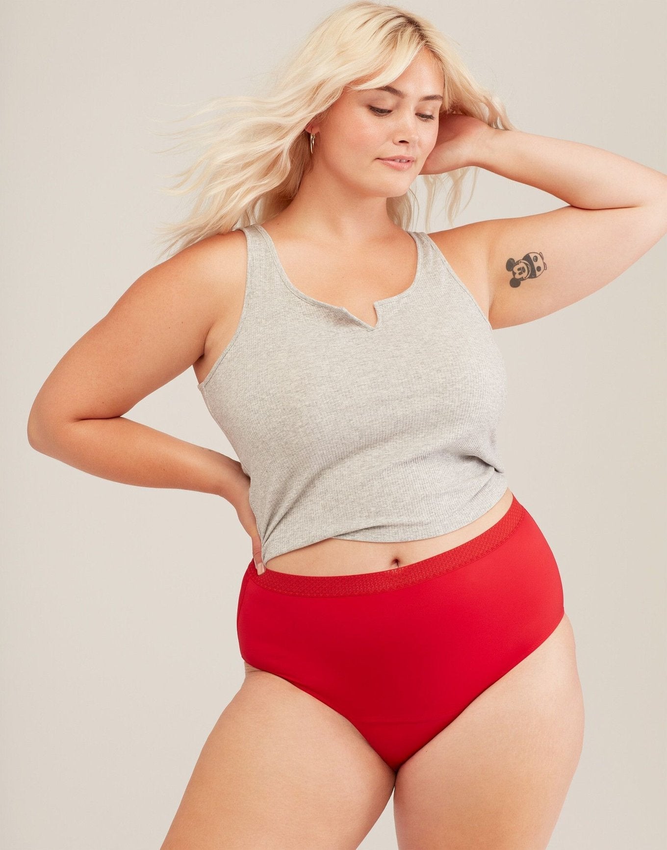Model wearing red Jess Joyja panties