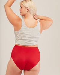 Model wearing red Jess Joyja panties